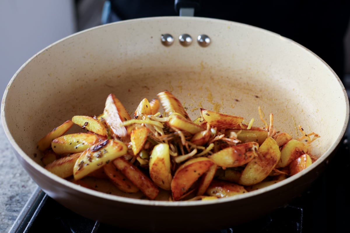 potatoes and aromatics mixed together