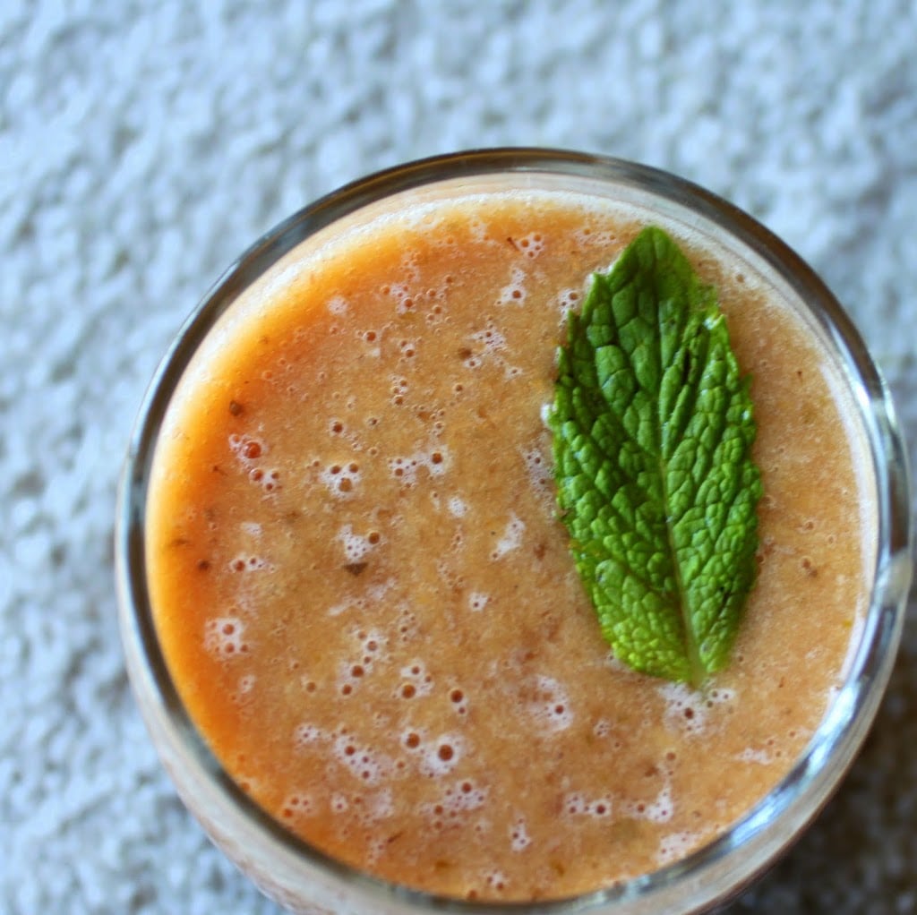 Mango strawberry mint cumin spiced cooler. Refreshing and delicious this summer drink is a great way to use up leftover fruit. Vegan and Gluten Free Recipe #glutenfree #veganricha #vegan