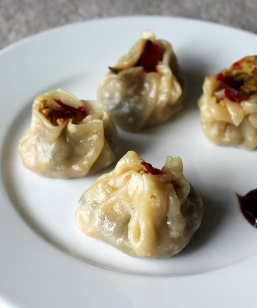Shu Mai /Siu Mai dumplings filled with broccoli and zucchini in garlic sauce. A delicious snack or appetizer, I served these dumplings with beet slices and hoisin sauce. Vegan Recipe. #veganricha #vegan