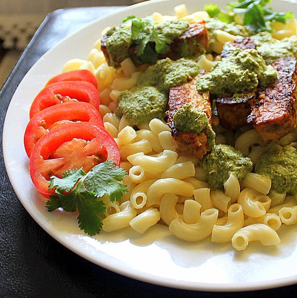 Pasta with Spicy Blackened Tempeh and Cilantro Almond Pesto. A delicious and simple pasta dish made with a creamy almond pesto. Vegan and Gluten Free. #glutenfree #veganricha #vegan