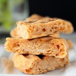 pieces of sprouted quinoa flat bread stacked on top of eachother