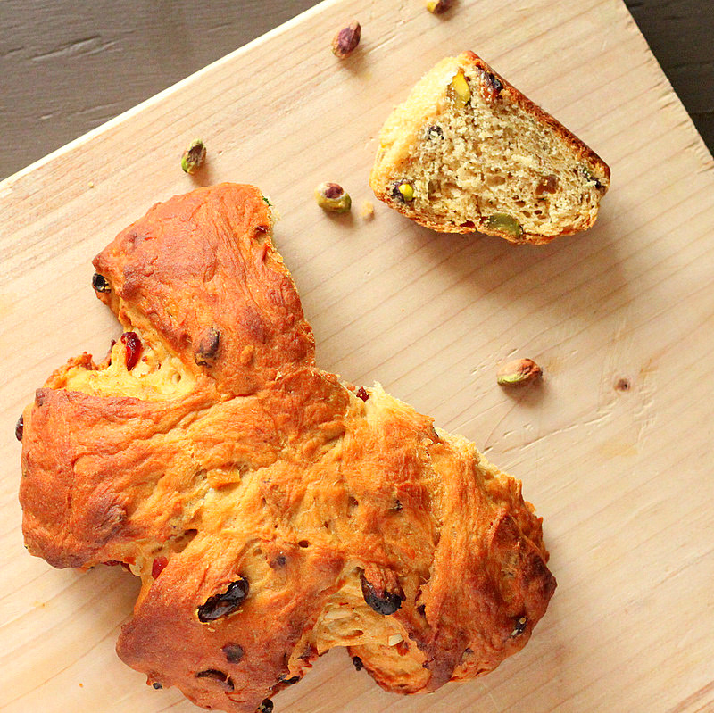 Christmas stollen wreath with cranberries, Pistachios and Candied Orange. Vegan Recipe. #veganricha #vegan