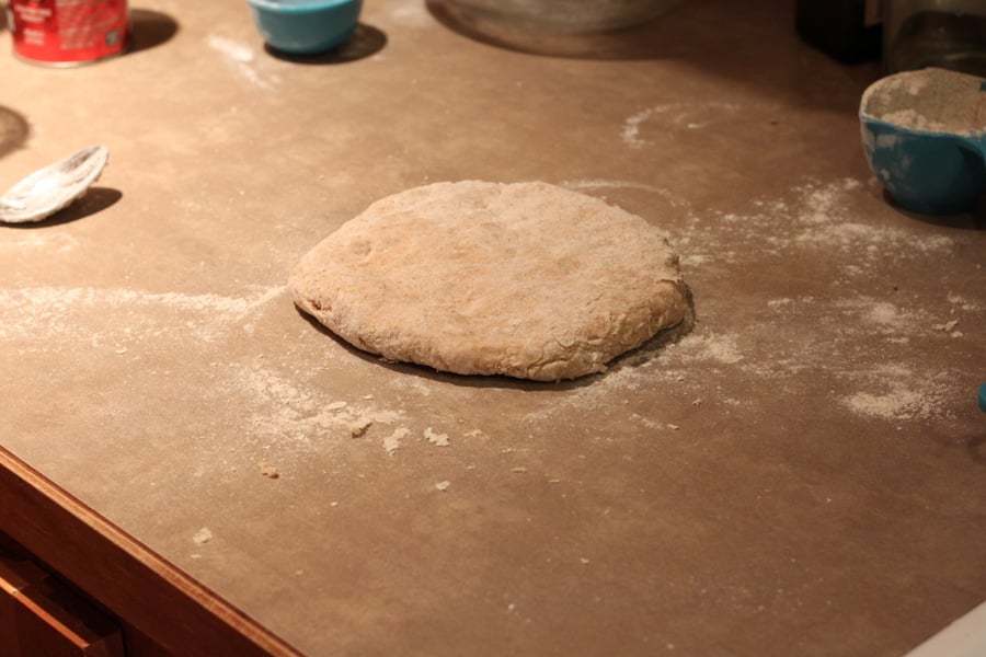 vegan cinnamon rolls dairy-free yeasted dough for cinnamon rolls being rolled out into a rectangle