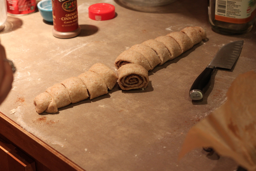vegan cinnamon rolls cinnamon rolls being cut