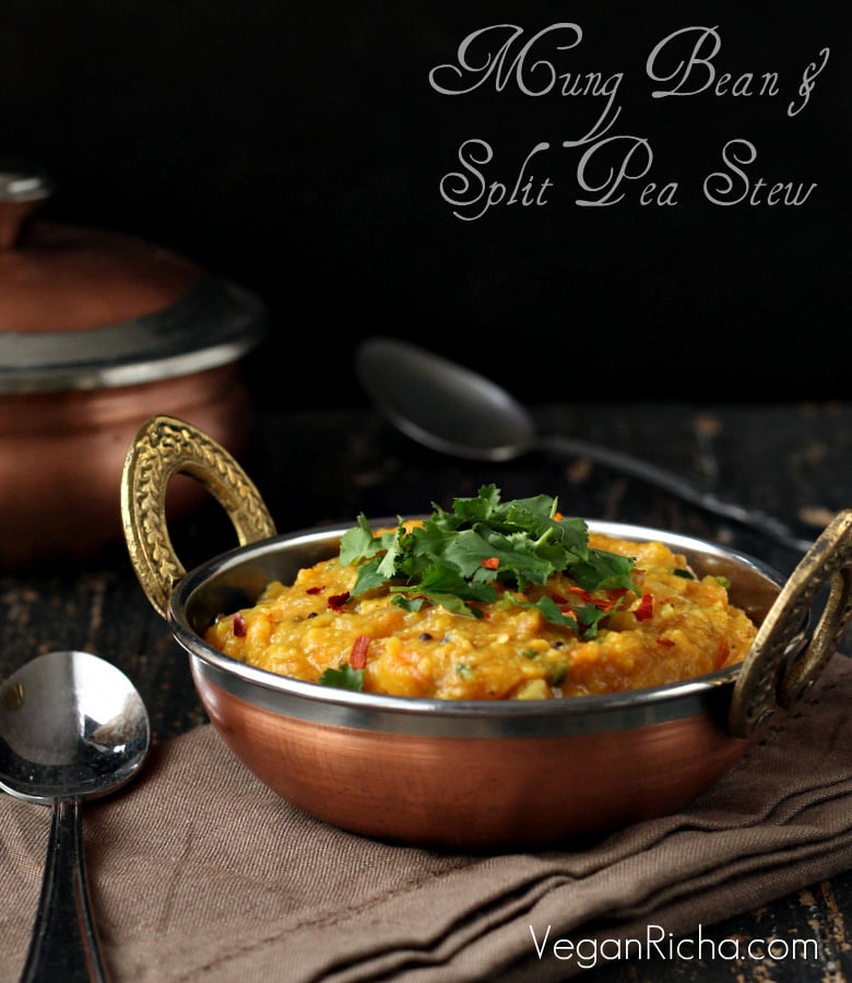 side view of a bowl of vegan Mung Dal and Pigeon Pea Stew garnished with fresh herbs 