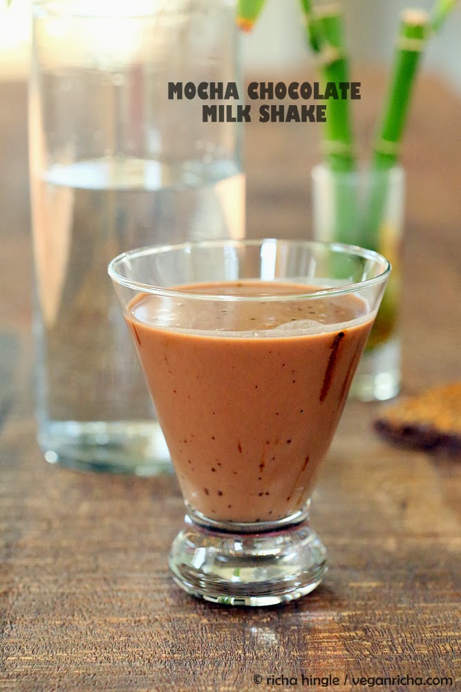 vegan milkshakes side view of a glass of thick and creamy Vegan Mocha Milkshake