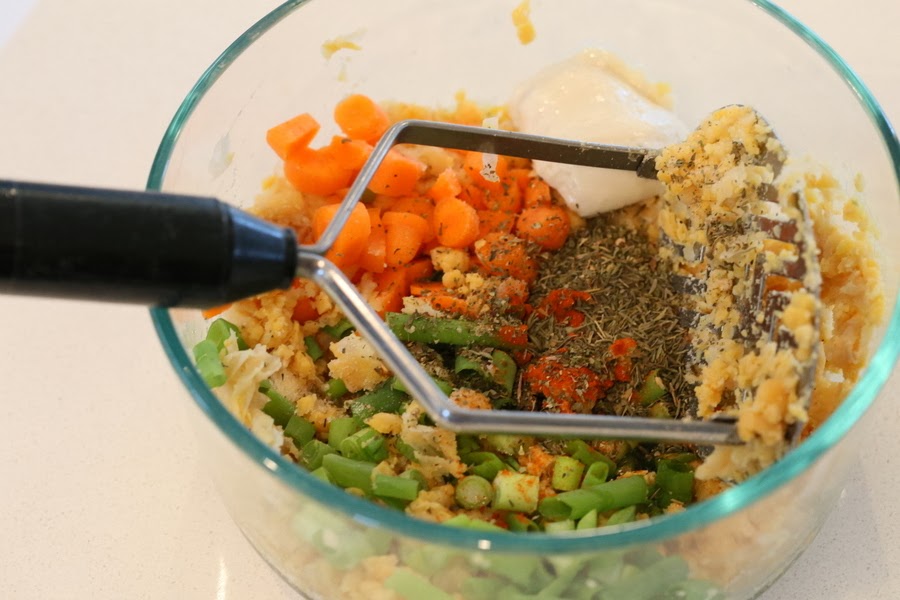 stuffed portobello mushrooms chickpea stuffing ingredients for stuffed portobello mushrooms recipe being mixed in a bowl