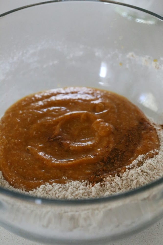 sweet potato biscuits sweet potato puree being mixed with dry ingredients to make vegan sweet potato biscuits
