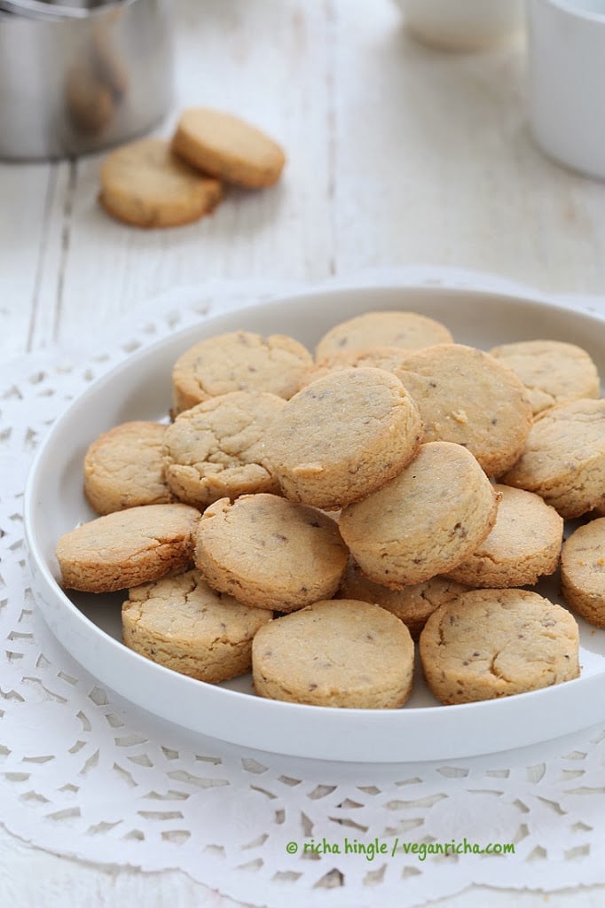 vegan sugar cookies vegan sugar cookies on a white cookie plate