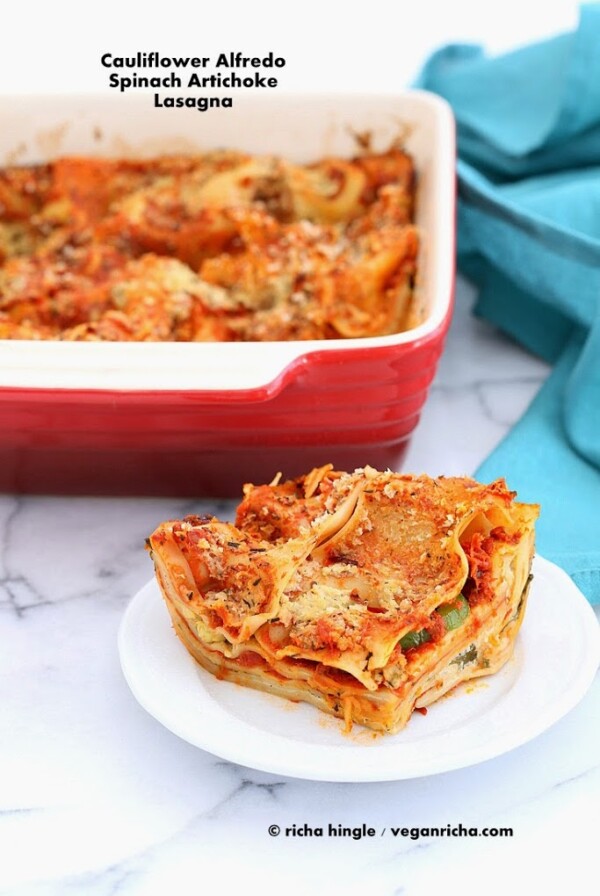 This Vegan Cauliflower Alfredo Lasagna is filled with Spinach, Artichokes, alfredo sauce, veggies and is a perfect main. Easy Creamy Cauliflower alfredo Sauce Recipe. Vegan Soy-free Nut-free. Makes 1 9 by 9 square lasagna pan. #vegan #glutenfree #veganricha
