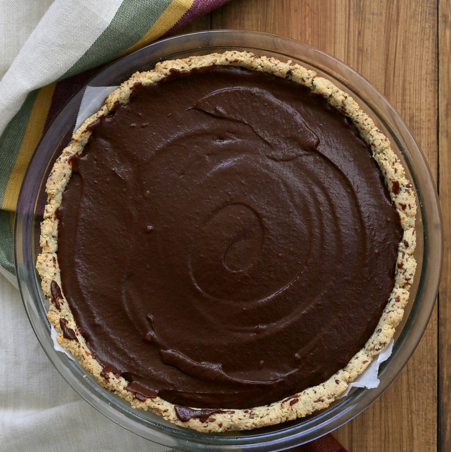 vegan pumpkin pie overhead shot of a whole Vegan Chocolate Pumpkin Pie in a pyrex pie dish
