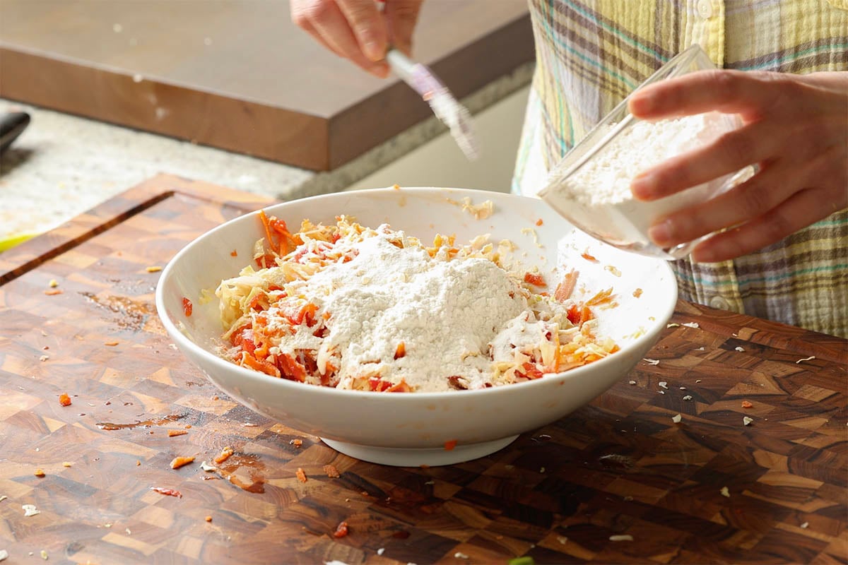 adding flour to the veggie mixture