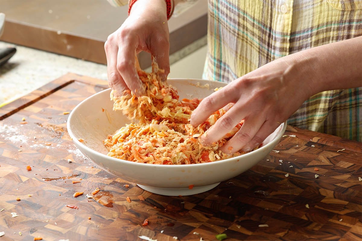 mixing up the okonomiyaki batter