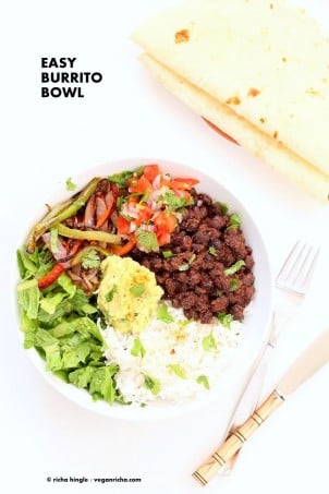 Easy Black Bean Burrito Bowl. Spicy black beans, roasted peppers and veggies, zesty guacamole, pico de gallo, fresh lettuce. DIY Burrito Bowl Chipotle style. | VeganRicha.com #vegan #glutenfree #soyfree #bowl #recipe