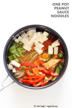 One pot peanut sauce noodles, Ready in 20 minutes! Brown Rice Noodles, Veggies, Peanut or Almond Butter, spices, flavors, boil and done. Easy Quick Weeknight Dinner Recipe | VeganRicha.com #glutenfree #veganricha #vegan