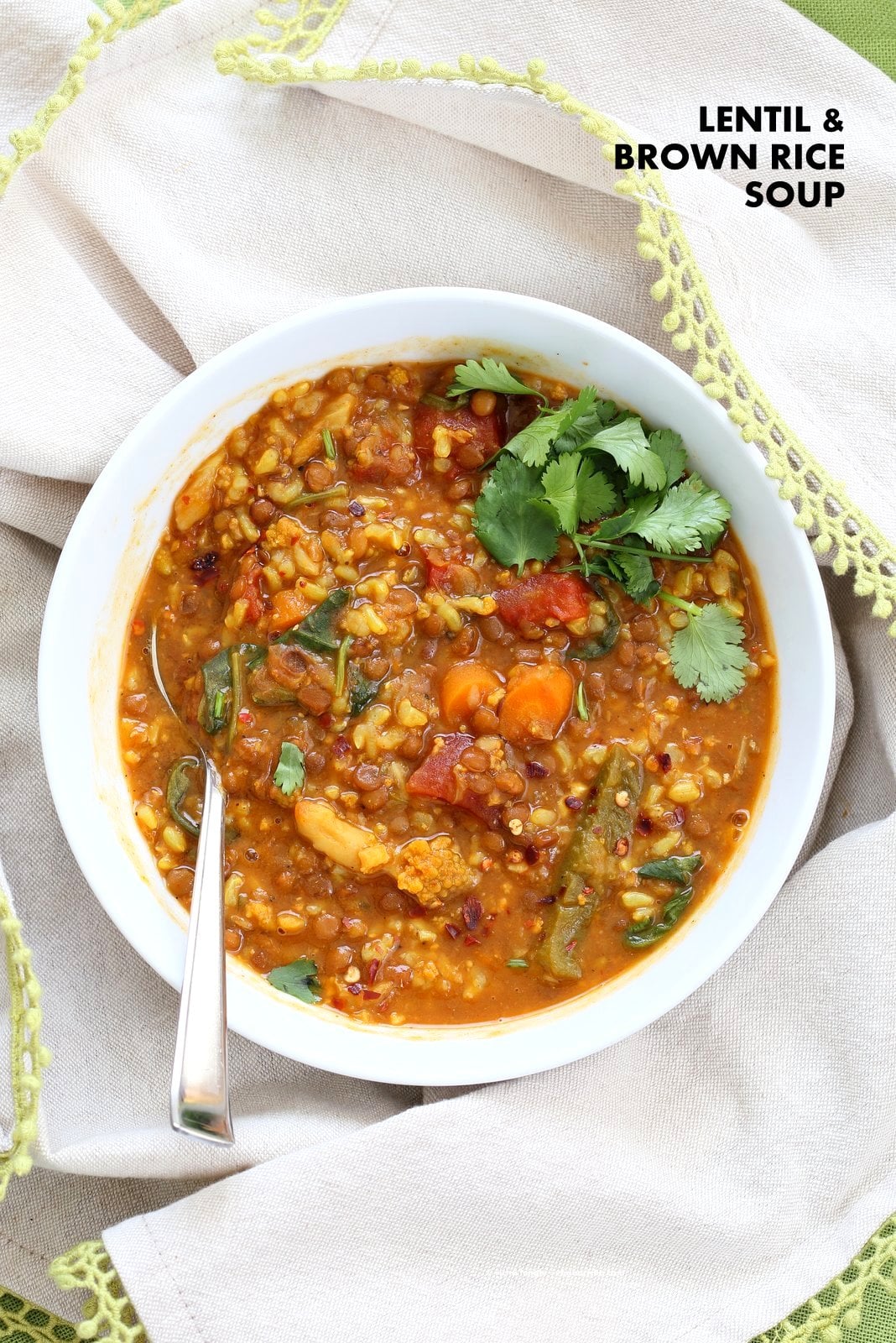 Lentil Brown Rice Soup. Easy 1 pot Lentil Rice Soup with Spinach or greens of choice. 20 minutes active time then let everything simmer. Serve with crackers, papadum or grilled vegan cheese sandwiches. Vegan Gluten-free Soy-free Recipe | VeganRicha.com #vegan #glutenfree #veganricha