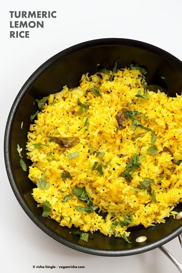 Turmeric Lemon Rice Recipe. Golden Rice with turmeric, lemon and mustard seeds. Use cooked brown rice, quinoa or millet or couscous for variation. Easy side. Vegan Gluten-free Soy-free Recipe | VeganRicha.com #vegan #glutenfree #veganricha