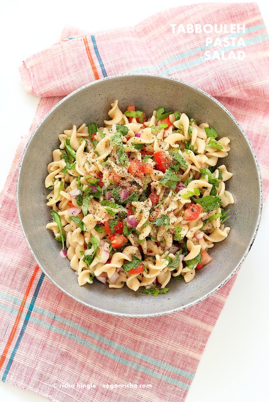 Tabbouleh Pasta Salad. Parsley, tomatoes, fusilli pasta dressed with olive oil, salt, pepper and lemon. Fresh Summer Salad. #Vegan #Soyfree Recipe. Can be made #glutenfree with gf pasta. | VeganRicha.com