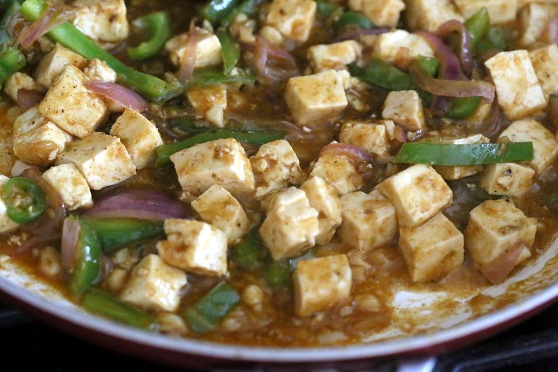 Chilli Tofu - Indian Chilli "Paneer" Recipe. Chilli Paneer is an Indo-chinese fusion stir fry served with other fusion noodles or fried rice. Crisp Tofu replaces the Paneer cheese in this delicious and quick version. Vegan Gluten-free Nut-free Recipe | VeganRicha.com