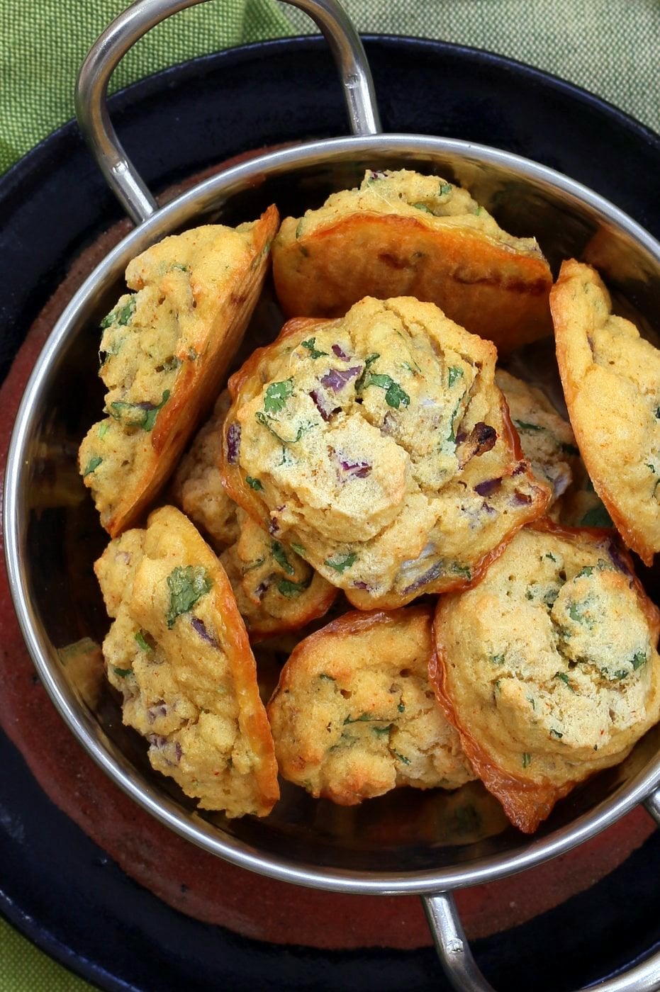 Mung Dal Fritters - Baked Moong Dal Pakoda. Petite yellow lentils (split and skinned mung beans) soaked and blended to a batter to make pakoda/Bhajji with onions and greens. Use red lentils or chickpea flour for variation. Vegan Gluten-free Recipe | VeganRicha.com