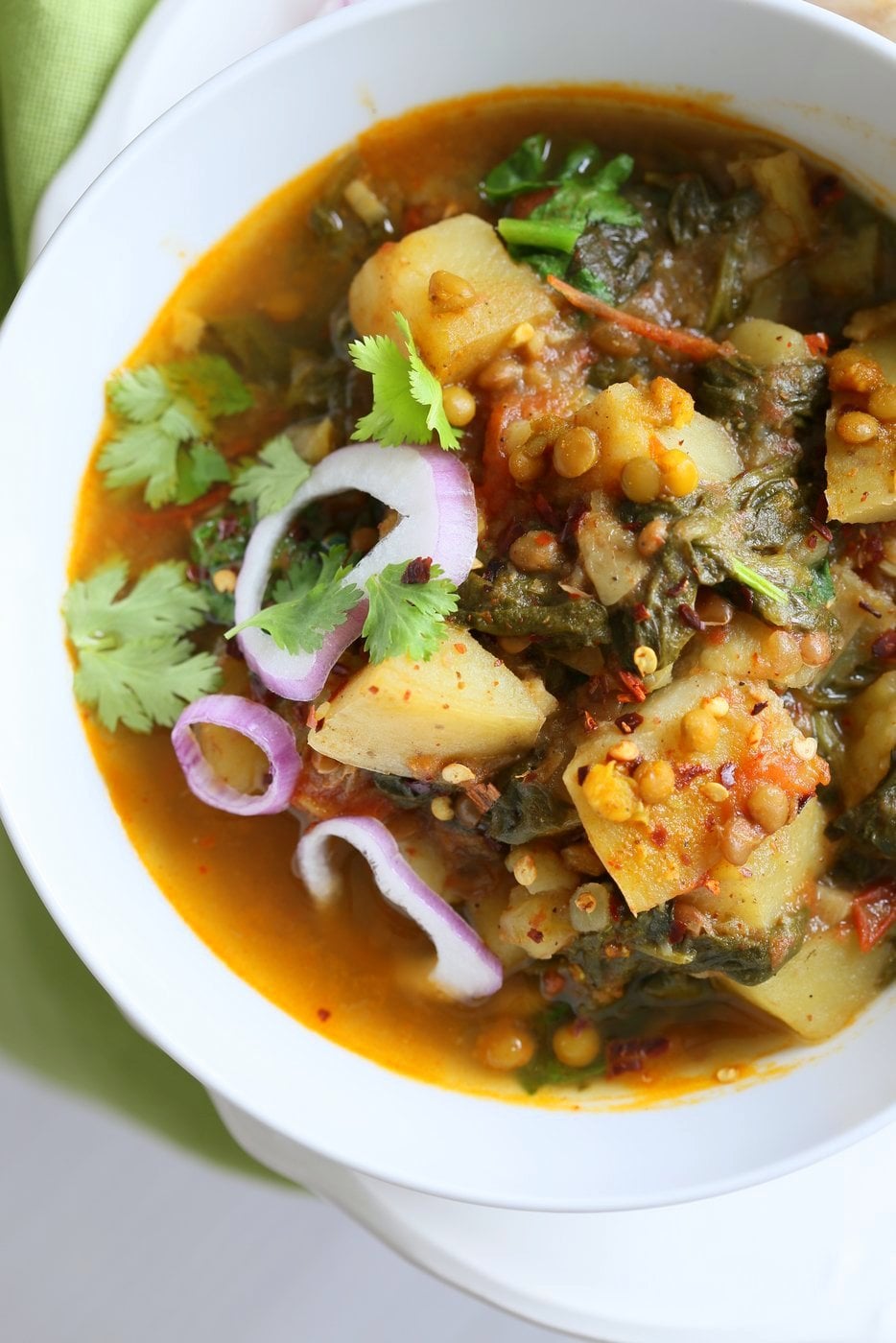 Instant Pot Aloo Palak Dal. Spiced Potato Spinach Lentils made in a pressure cooker or Instant Pot. Saucepan option. Vegan Gluten-free Soy-free Nut-free Recipe | VeganRicha.com