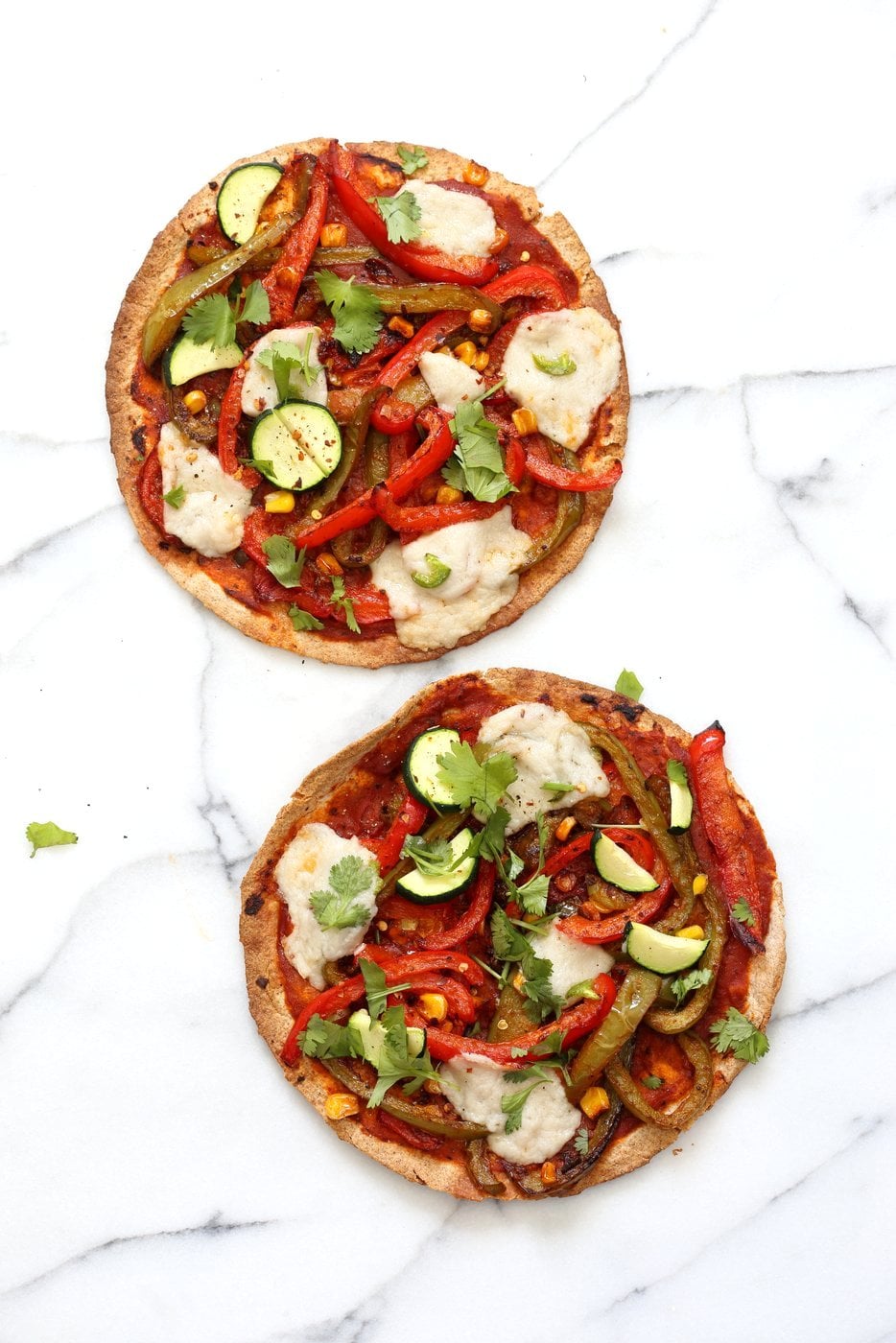 Easy Baked or Grilled Vegetable Fajitas Tortilla Pizza. Toss the peppers, corn and veggies in smoky Fajita Seasoning, then grill with vegan cheese. Top with salsa or other toppings. Vegan Soyfree Recipe. Easily Glutenfree | VeganRicha.com