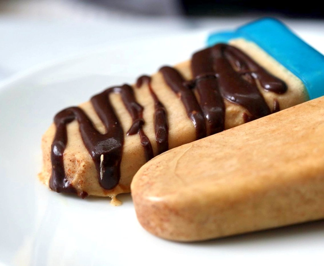 These 5 Ingredient Chocolate Peanut Butter Ice Cream Popsicles are like Peanut Butter Cup pops. Creamy Nut butter ice cream drizzled with melted chocolate. Vegan Gluten-free Recipe | VeganRicha.com