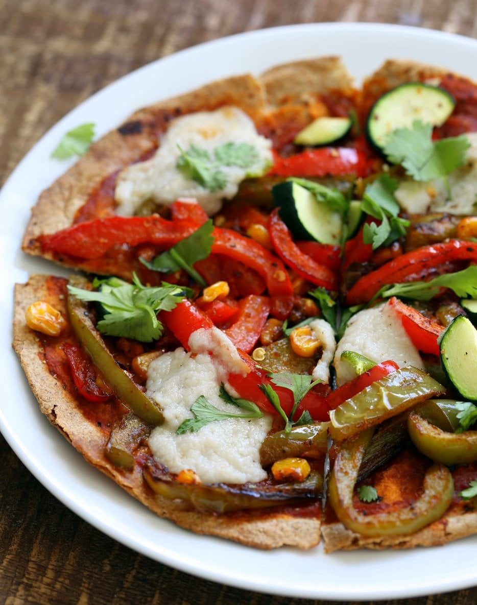 Easy Baked or Grilled Vegetable Fajitas Tortilla Pizza. Toss the peppers, corn and veggies in smoky Fajita Seasoning, then grill with vegan cheese. Top with salsa or other toppings. Vegan Soyfree Recipe. Easily Glutenfree | VeganRicha.com