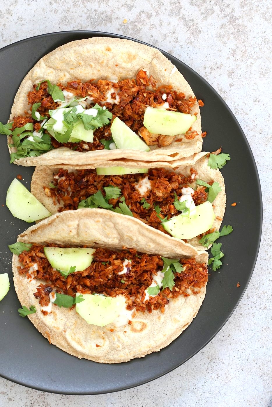 Berbere Spiced Jackfruit Tacos. Jackfruit and onion mixed with Berbere spice blend and baked to caramelized spiced perfection. Add some chickpeas to make into a hearty meal. Vegan Soy-free Nut-free Recipe, Can be Glutenfree | VeganRicha.com