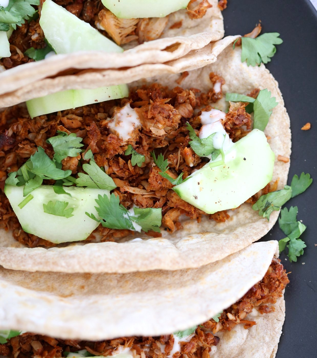 Berbere Spiced Jackfruit Tacos. Jackfruit and onion mixed with Berbere spice blend and baked to caramelized spiced perfection. Add some chickpeas to make into a hearty meal. Vegan Soy-free Nut-free Recipe, Can be Glutenfree | VeganRicha.com