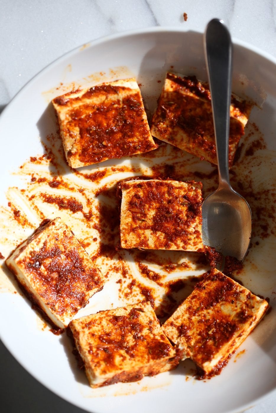 Cajun Tofu with Cilantro Lime Rice. Baked Cajun Spiced Tofu, over greens, cilantro lime rice, and tomatoes. Easy Spicy Bowl. Vegan Gluten-free Nut-free Recipe. Use Chickpea tofu to make soy-free. | VeganRicha.com