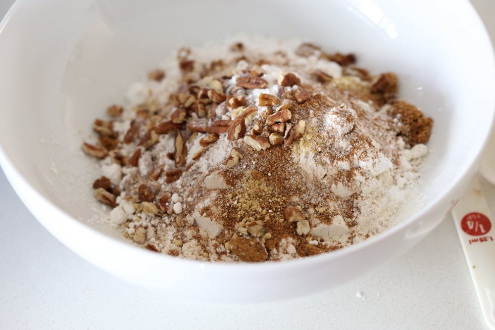 Vegan Pumpkin Coffee Cake with Pecan Crumb. Easy 1 Bowl Pumpkin Cake, topped with Chai Spice Pecan Streusel. Just 15 mins prep. Soft, Spiced, Delicious. Vegan Soy-free Recipe. | VeganRicha.com