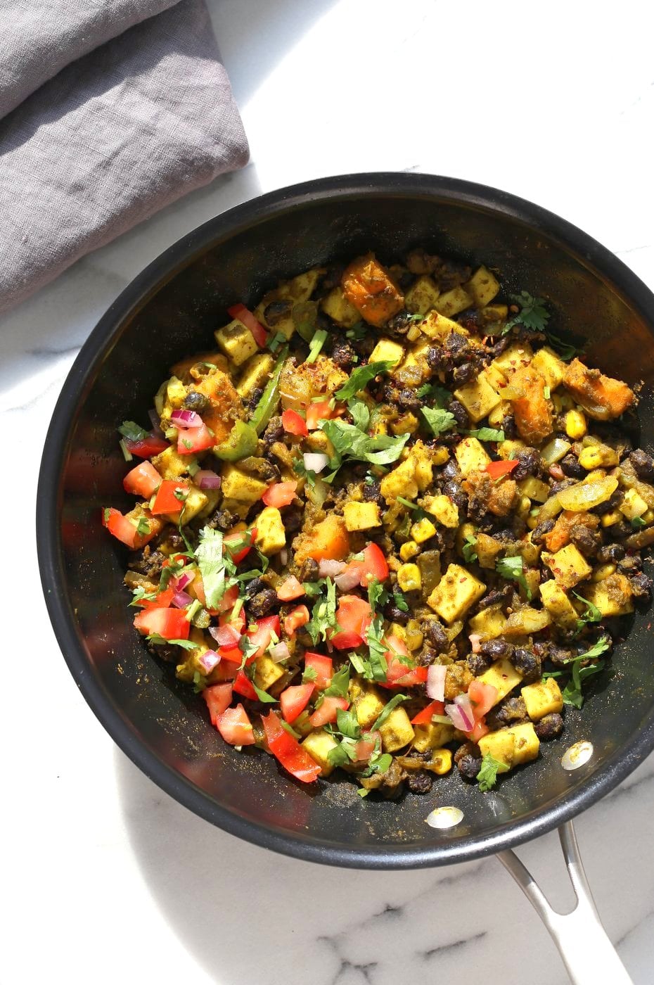 Southwestern Tofu Scramble with Chickpea Tofu. Scrambled Tofu without Soy tofu! Soy-free Breakfast Scramble with Black beans, Veggies, Sweet Potatoes, Spices, Chickpea flour Tofu. Double Protein Savory Vegan Breakfast. Gluten-free Soy-free Nut-free | VeganRicha.com