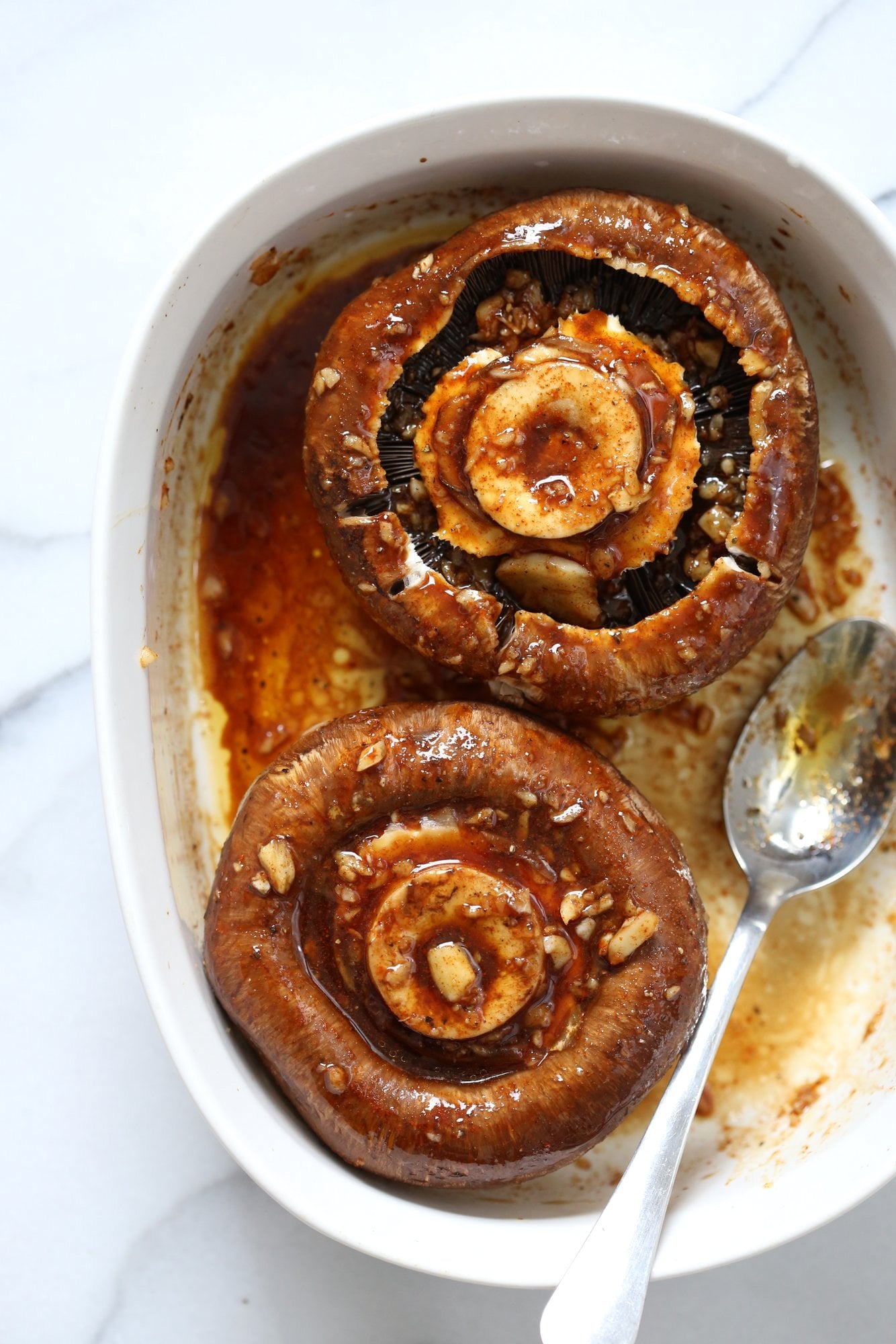 Grilled Portobello Mushrooms with Garlic Sauce. Grilled or Baked Marinated Portabella Mushrooms served with creamy gravy. #Vegan #Glutenfree #Recipe #veganricha | VeganRicha.com