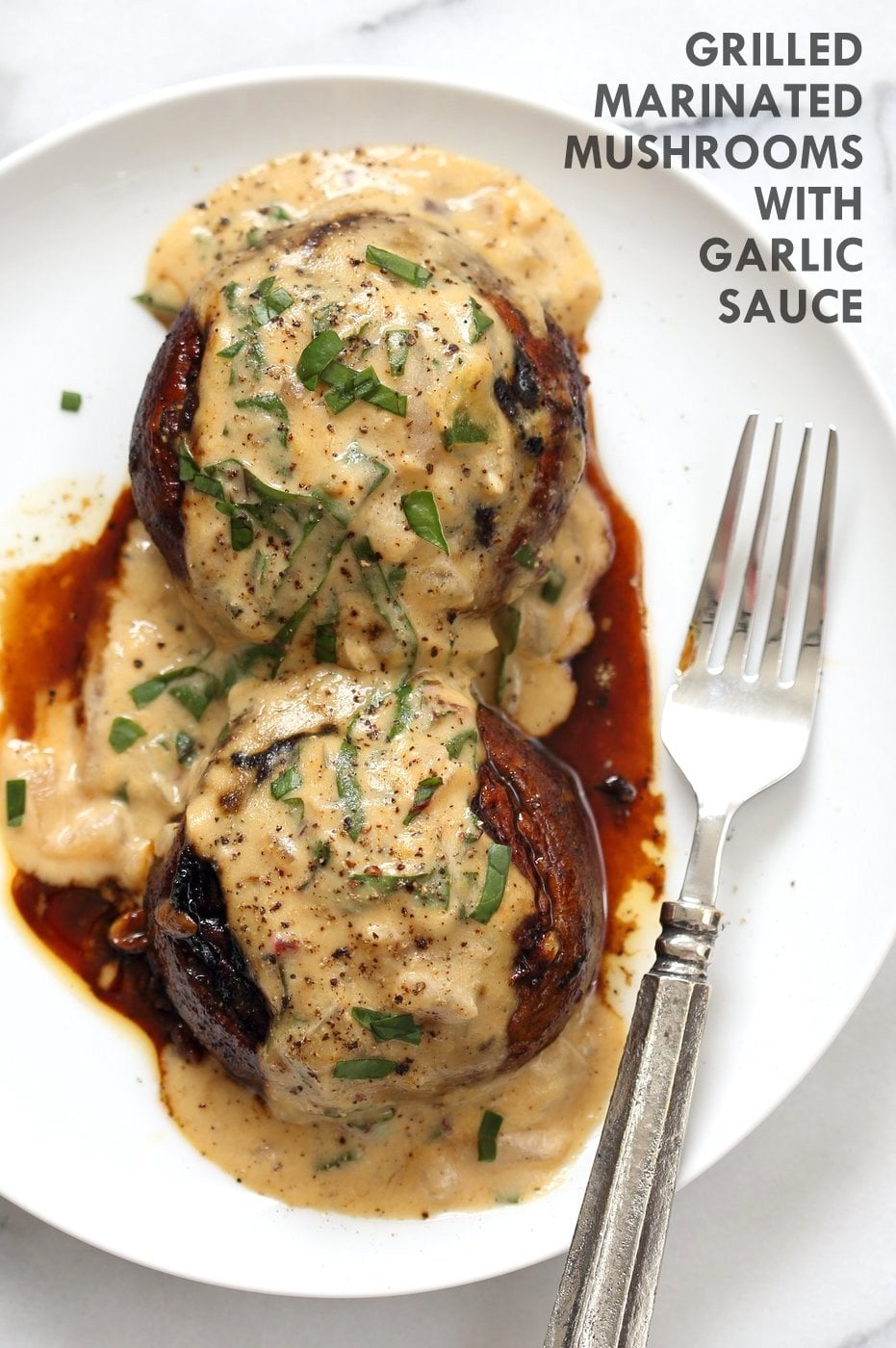 Grilled Portobello Mushrooms with Garlic Sauce. Grilled or Baked Marinated Portabella Mushrooms served with creamy gravy. #Vegan #Glutenfree #Recipe #veganricha | VeganRicha.com