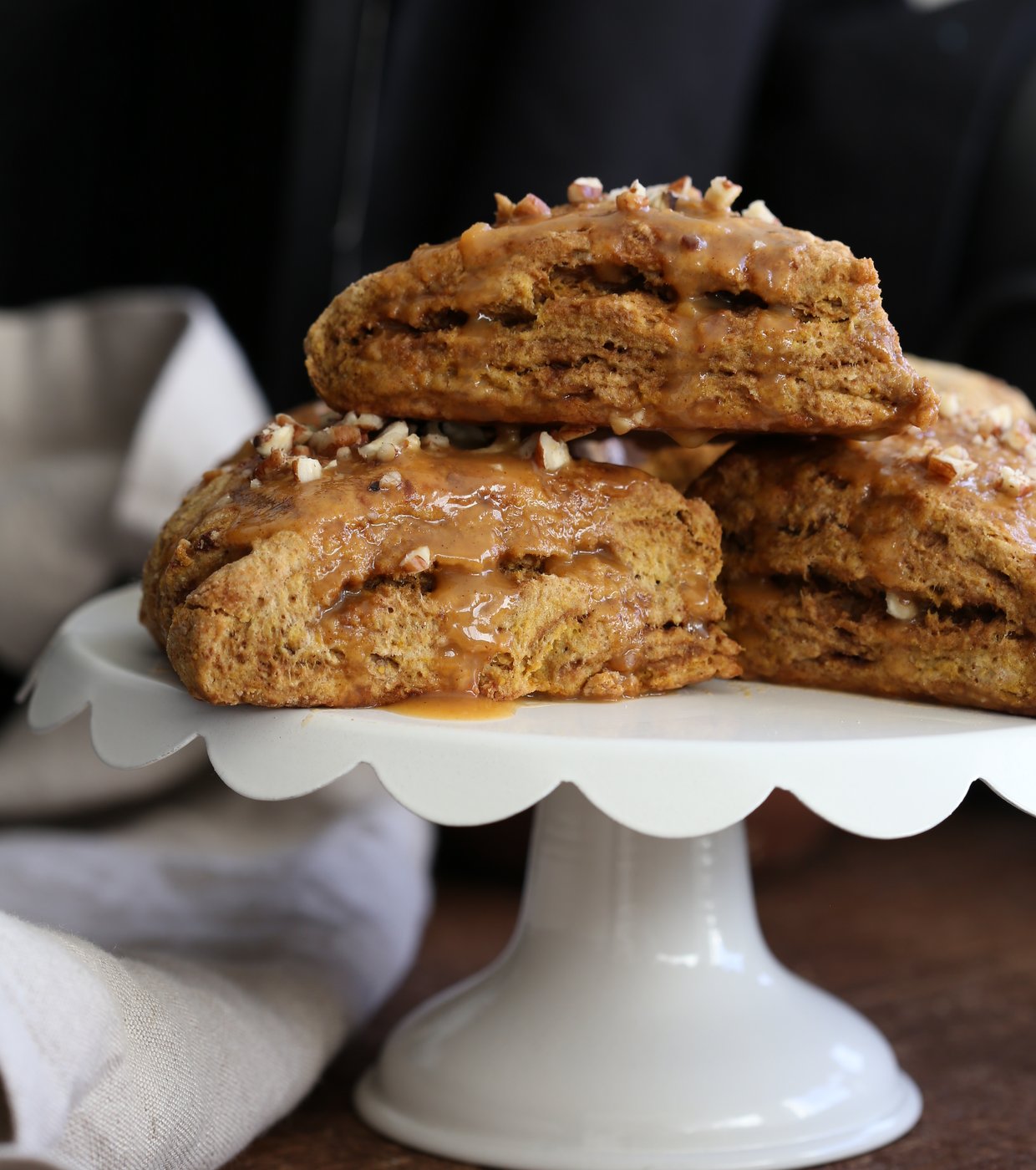 Vegan Pumpkin Scones with Spiced Pumpkin Caramel Glaze Oil-free. These Easy Scones use coconut cream instead of oil and make for a great breakfast with the pumpkin glaze. #Vegan #Recipe #veganricha | VeganRicha.com