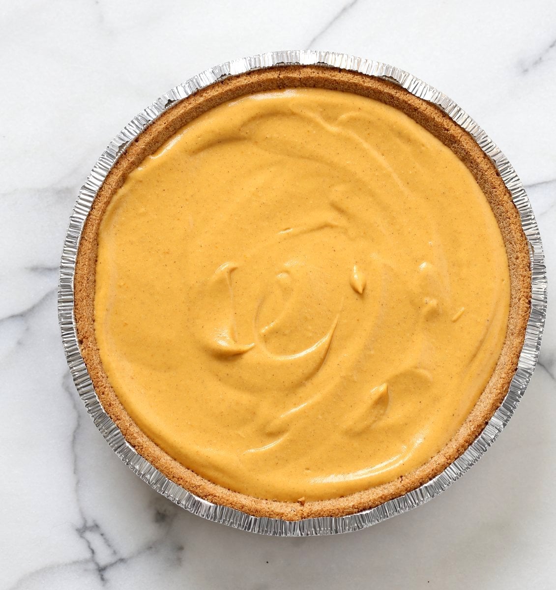 Vegan Pumpkin Cheesecake with graham cracker style crust. Easy Creamy Pumpkin Cheesecake to please everyone. Gluten-free with gluten free crust.# Soyfree #Recipe #vegan #pumpkinheesecake #veganricha | VeganRicha.com