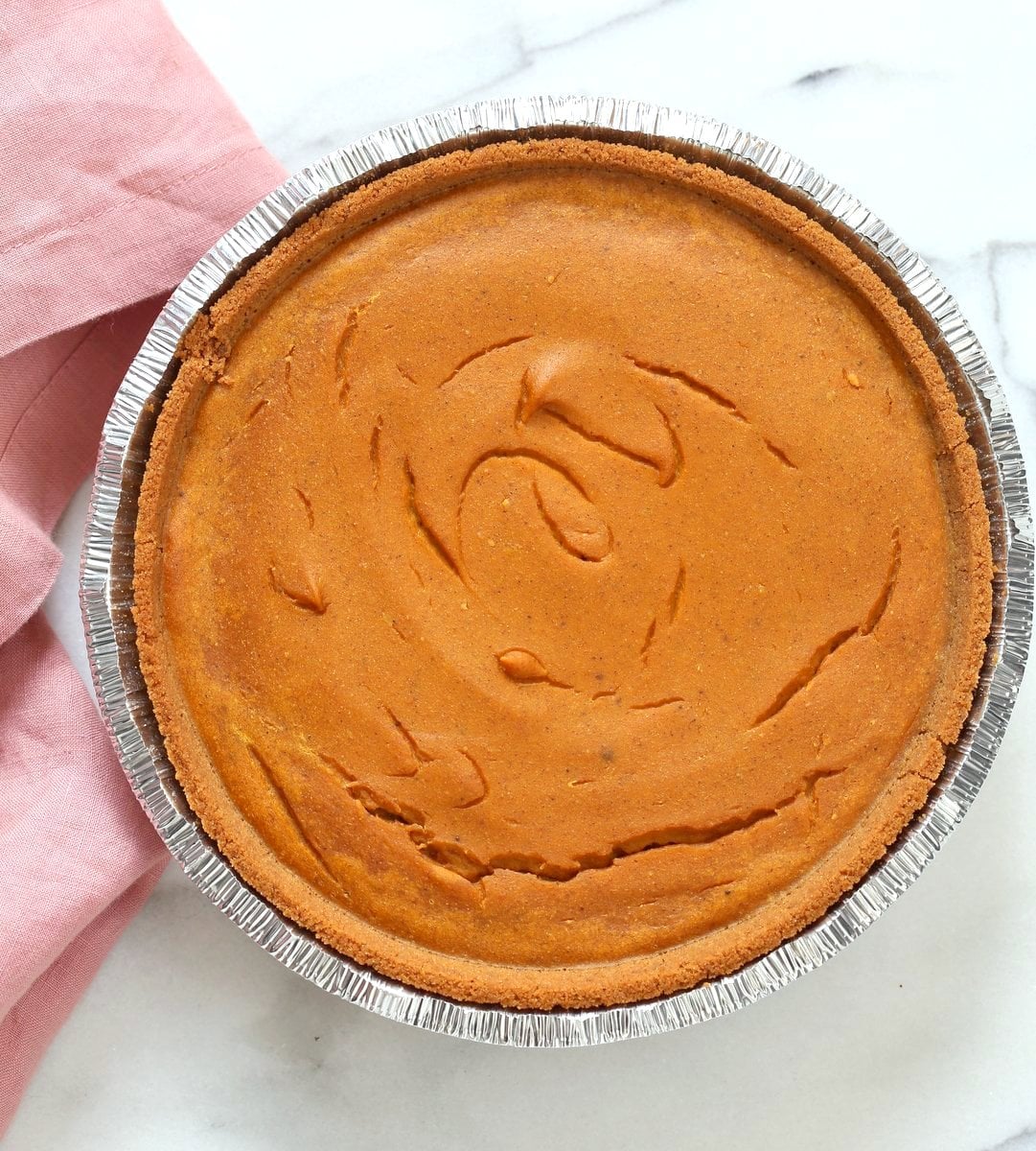 Vegan Pumpkin Cheesecake with graham cracker style crust. Easy Creamy Pumpkin Cheesecake to please everyone. Gluten-free with gluten free crust.# Soyfree #Recipe #vegan #pumpkinheesecake #veganricha | VeganRicha.com
