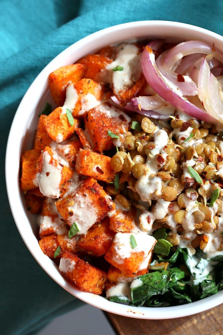 Spiced Sprouted Lentils, Cajun Roasted Sweet Potato Bowl with Veggies, Greens and Tahini Garlic Dressing. Vegan Gluten-free Soy-free Recipe. #vegan #veganricha | VeganRicha.com