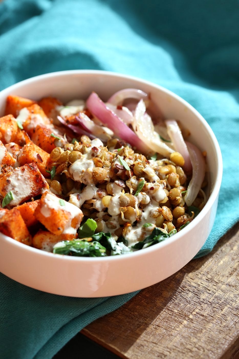 Spiced Sprouted Lentils, Cajun Roasted Sweet Potato Bowl with Veggies, Greens and Tahini Garlic Dressing. Vegan Gluten-free Soy-free Recipe. #vegan #veganricha | VeganRicha.com