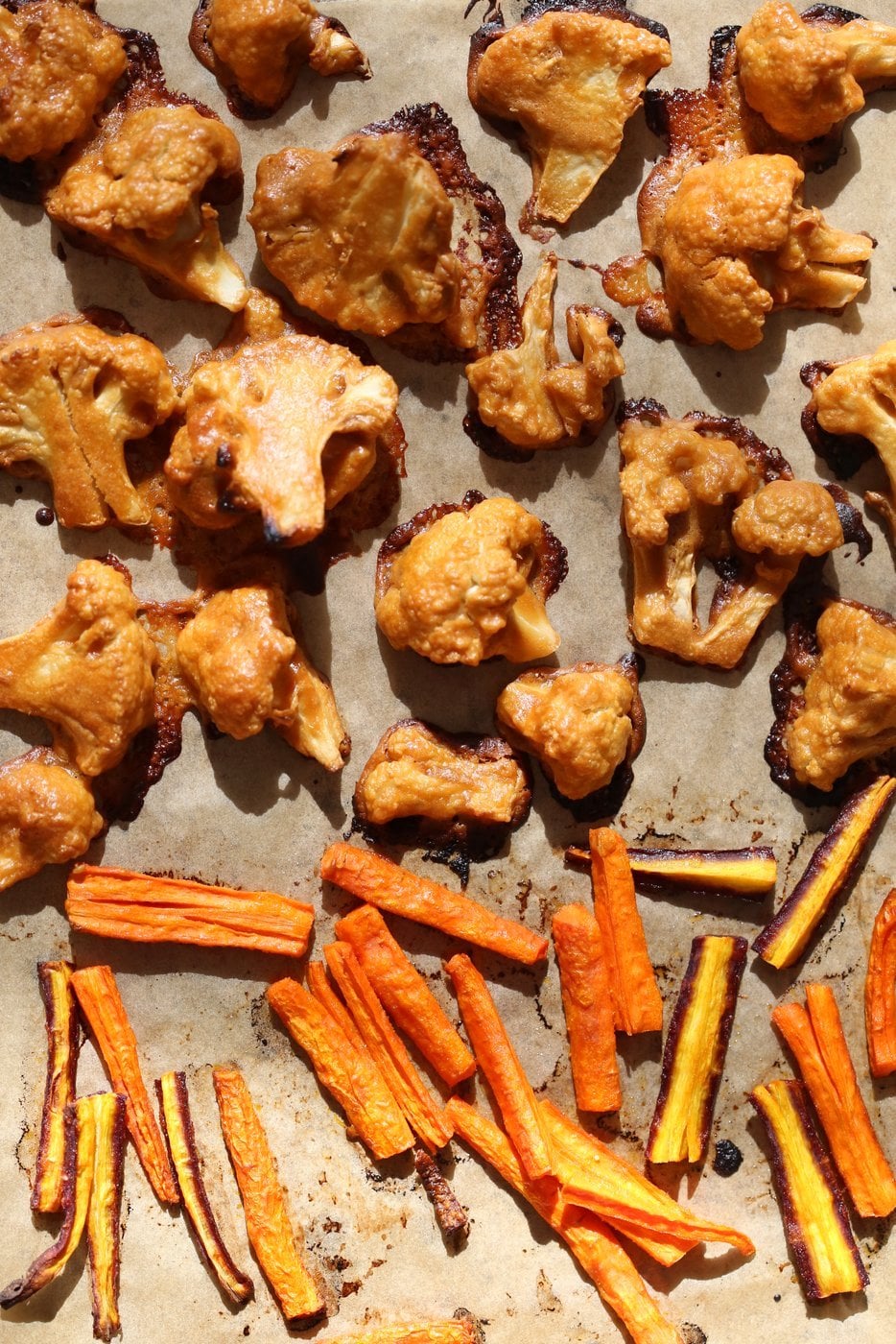 Peanut Butter Cauliflower Bowl with Roasted Carrots. Cauliflower tossed in peanut butter sauce and roasted, carrots tossed in hot sauce and roasted. Vegan Recipe, Gluten-free Recipe.  | VeganRicha.com