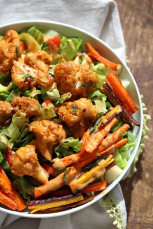 Peanut Butter Cauliflower Bowl with Roasted Carrots. Cauliflower tossed in peanut butter sauce and roasted, carrots tossed in hot sauce and roasted. Vegan Recipe, Gluten-free Recipe. | VeganRicha.com