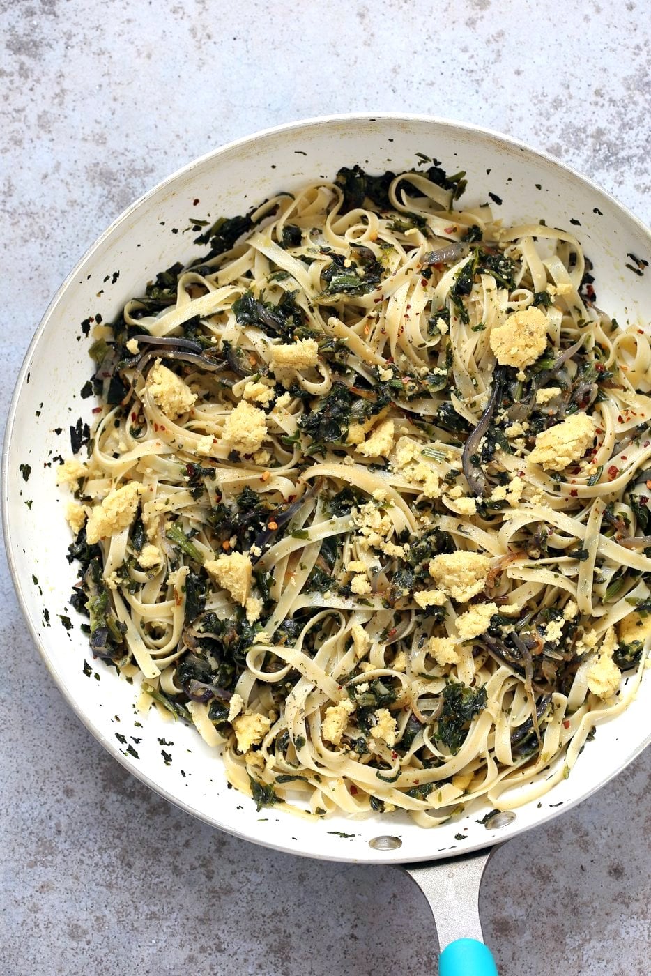 Fettuccine with Caramelized Onions, Greens and Vegan Feta - ish cheese. Easy Weeknight meal. Make the cheese ahead, then the dish is 1 Pot and 30 minutes. #Vegan, can be Gluten-free, Soy-free #veganricha | VeganRicha.com