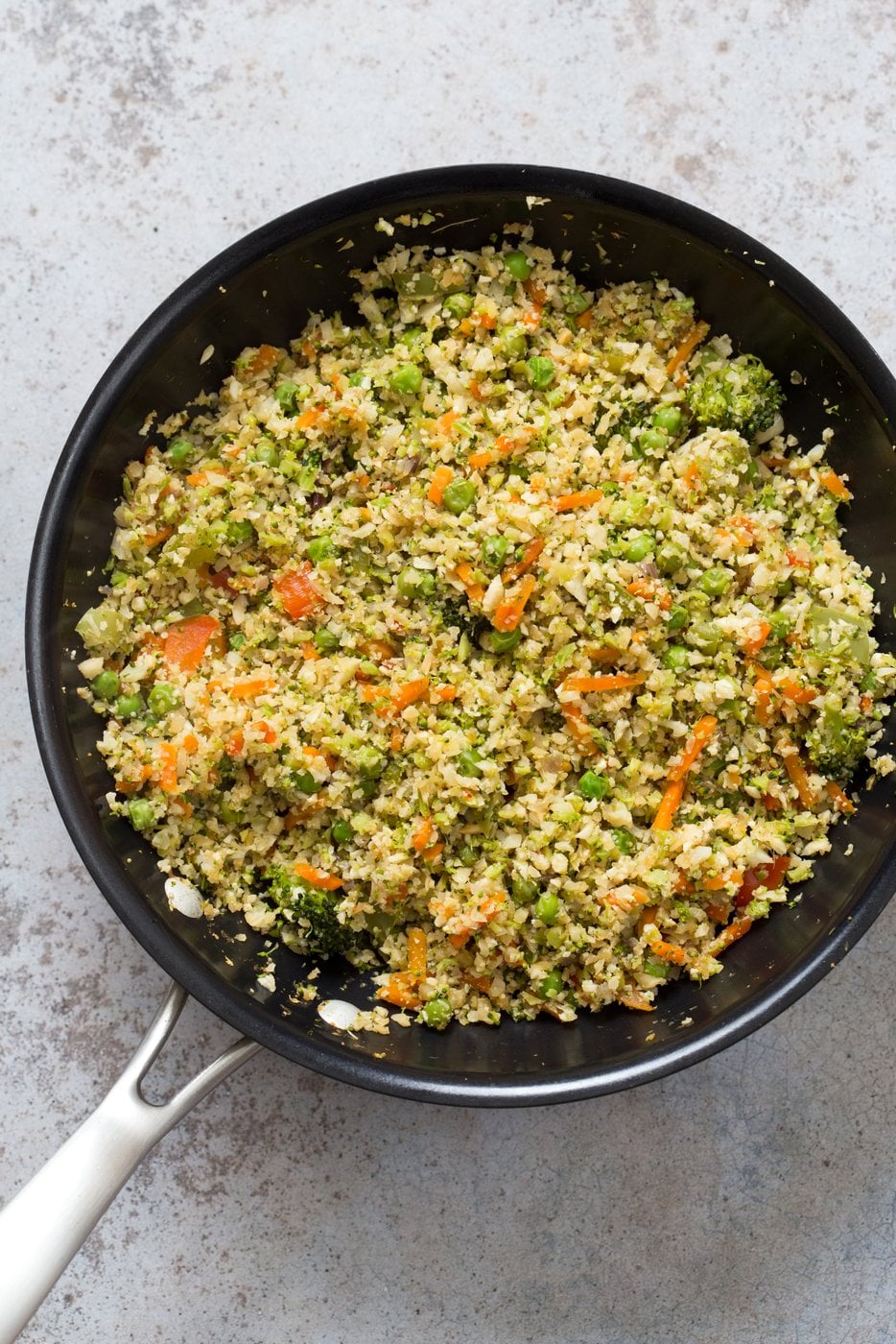 Cauliflower Fried Rice. Easy 1 Pot Fried Rice. No grains, low carb. So fluffy and so good. #Vegan #Glutenfree #Grainfree #Nutfree #Recipe #veganricha | VeganRicha.com