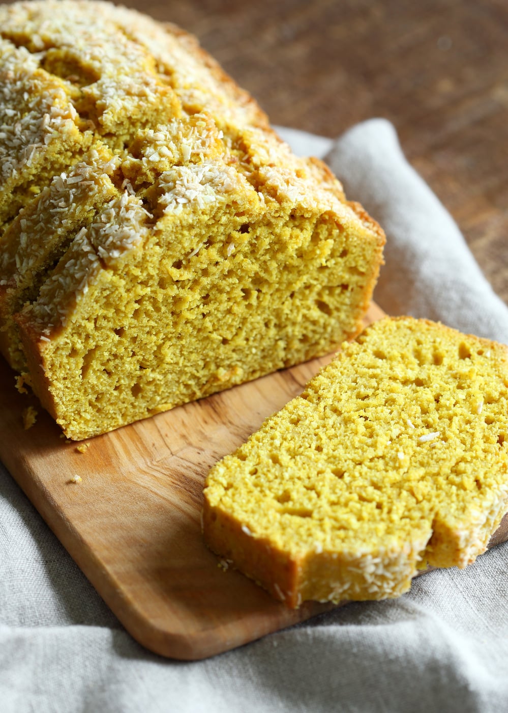 Easy 1 Bowl Coconut Turmeric Bread. Soft and Delicious 1 Bowl Golden Lemon Coconut loaf. No added oil in this cake. #Vegan #Nutfree Soyfree #Oilfree #Recipe. #veganricha | VeganRicha.com