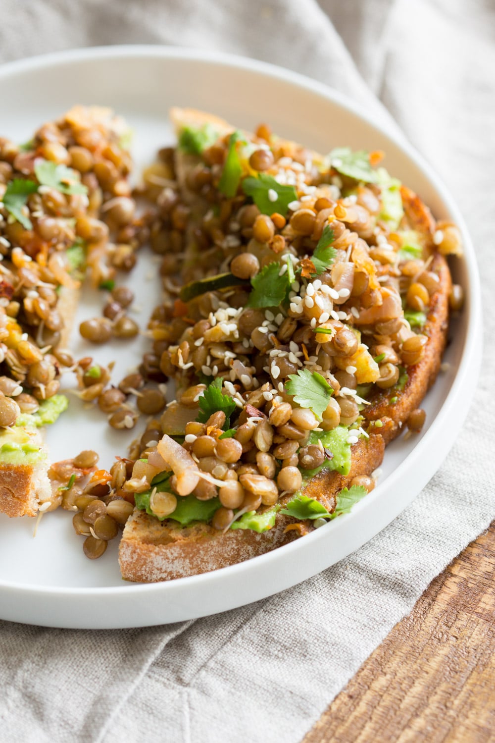 Ginger Coriander Sprouted Lentils Avocado Toast. Sprout Lentils or Mung Beans, Lightly saute with ginger, onion and tomato and serve over Mashed Avocado Toast. #Vegan #veganricha #Nutfree #Soyfree #Recipe | VeganRicha.com