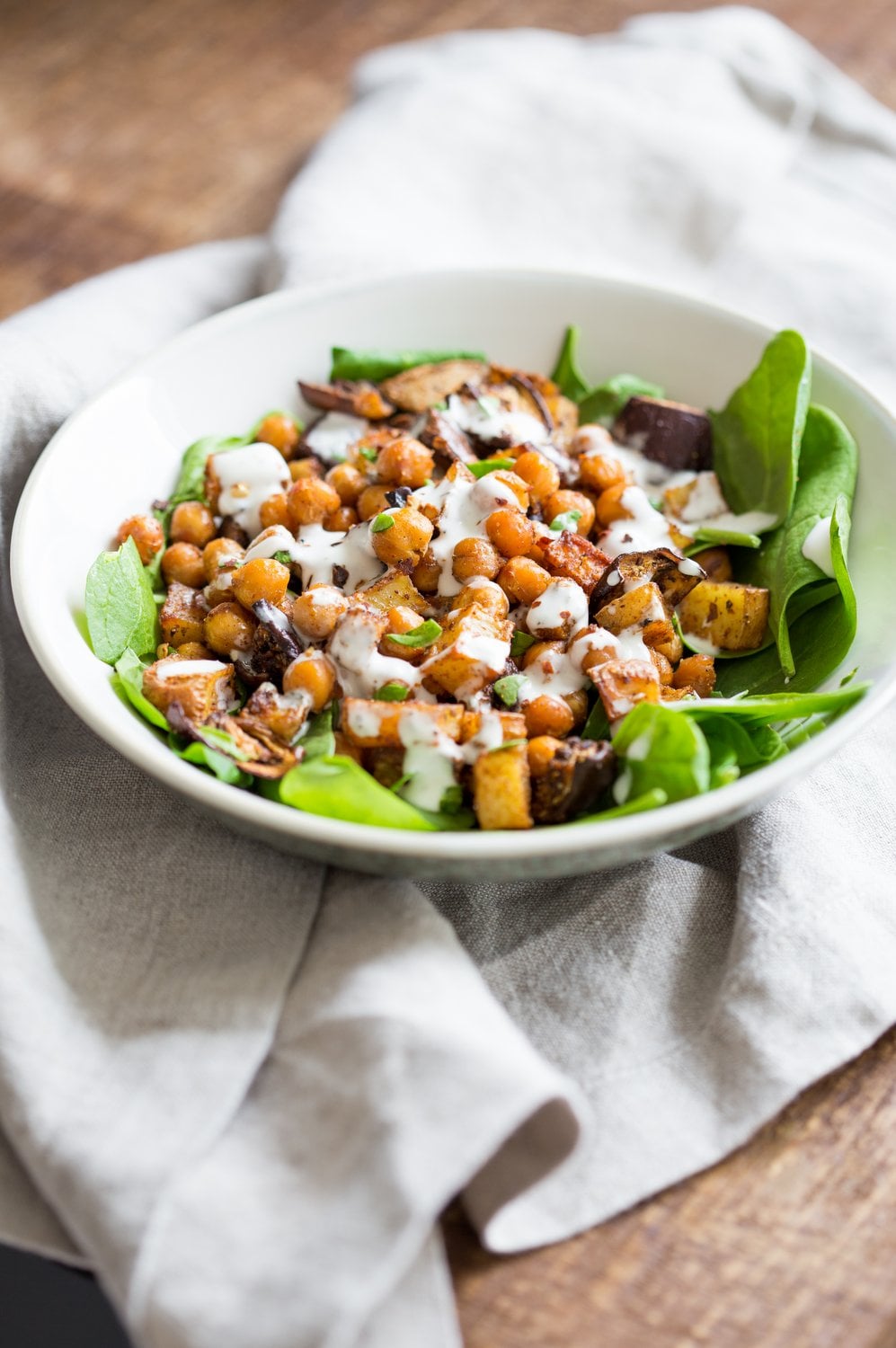 Roasted Eggplant Potatoes Chickpeas with Moroccan Merguez seasoning. Veggies tossed in Merguez blend, roasted then served with tahini dressing. #Vegan #Glutenfree #soyfree #Recipe #veganricha | VeganRicha.com
