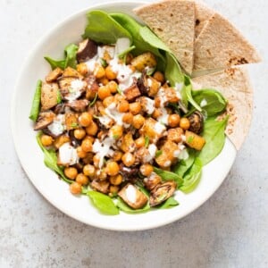 Roasted Eggplant Potatoes Chickpeas with Moroccan Merguez seasoning. Veggies tossed in Merguez blend, roasted then served with tahini dressing. #Vegan #Glutenfree #soyfree #Recipe #veganricha | VeganRicha.com