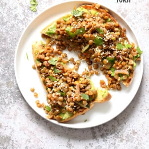 Ginger Coriander Sprouted Lentil Avocado Toast. Sprout Lentils of Mung Beans, Lightly saute with ginger, onion and tomato and serve over Mashed Avocado Toast. #Vegan #veganricha #Nutfree #Soyfree #Recipe | VeganRicha.com