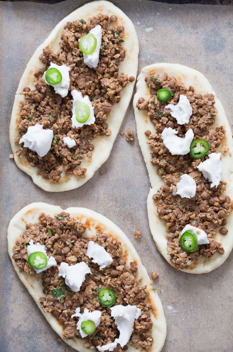 Vegan Keema Naan with Keema Lentils, onion, carrots and walnuts. These lentils with the herbs and spices make a vegan version of keema. Serve over Naan bread or Pizza or fill tacos or wraps. #Vegan #Recipe #veganricha, Can be gluten-free and soy free. | VeganRicha,com